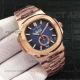 Perfect Replica Patek Philippe Nautilus White Moonphase Dial Rose Gold Case 44mm Watch (2)_th.jpg
